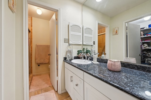 bathroom with vanity and tile patterned floors