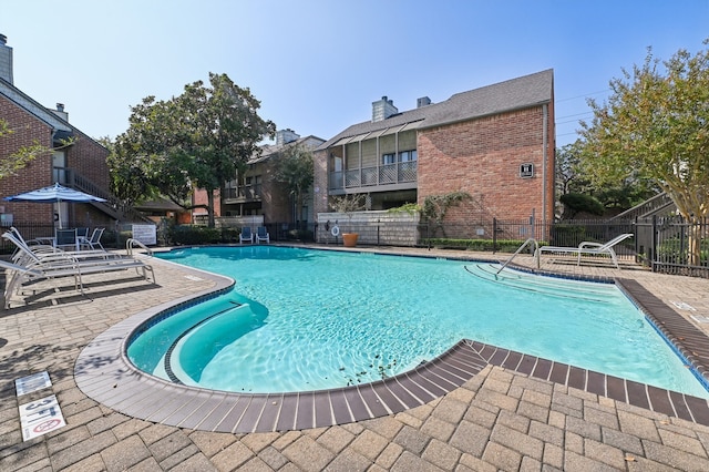 view of pool featuring a patio area