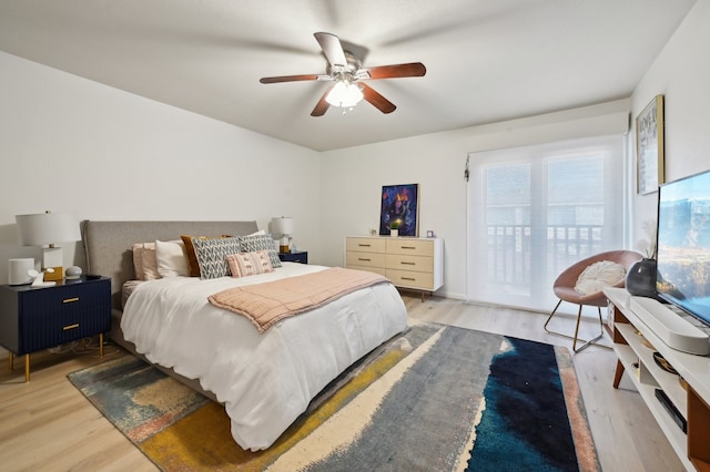 bedroom with ceiling fan and wood-type flooring