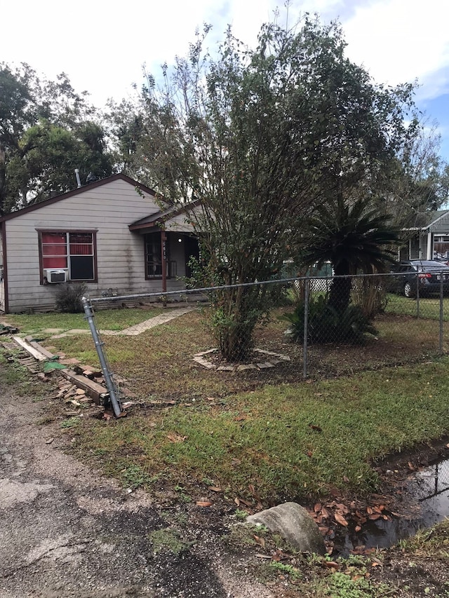 view of front of home featuring cooling unit