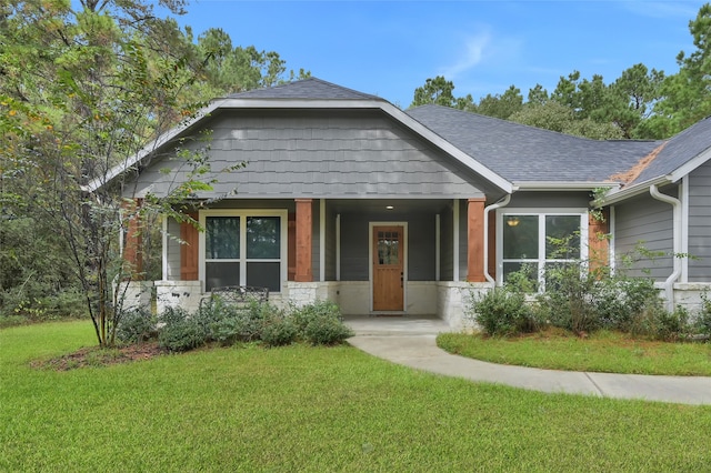 view of front of house featuring a front lawn and a porch