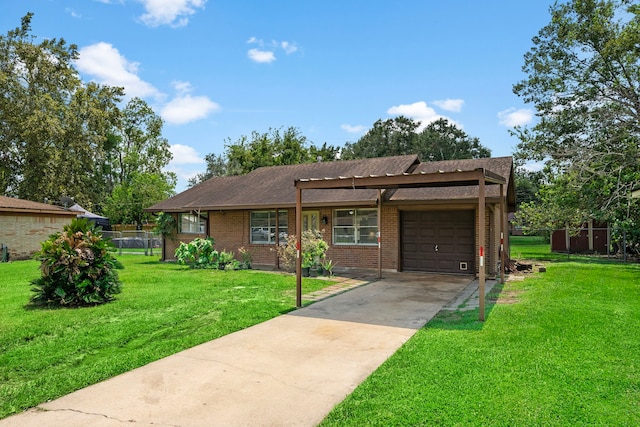 view of front of house with a front lawn and a garage