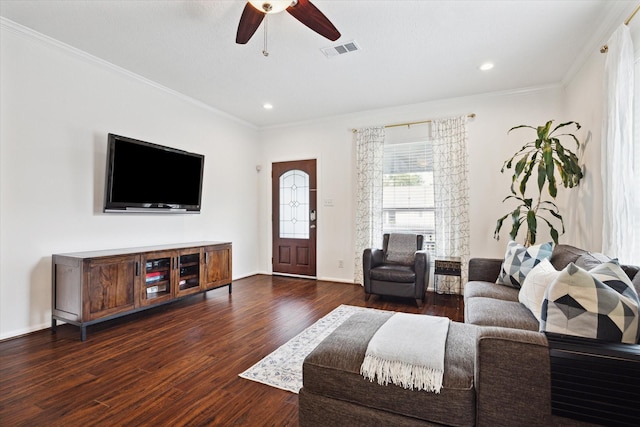 living room featuring ceiling fan, dark hardwood / wood-style flooring, and ornamental molding