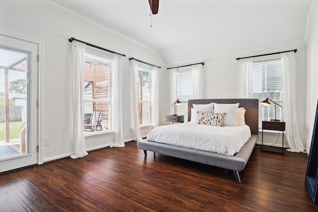 bedroom with ceiling fan, dark wood-type flooring, multiple windows, and lofted ceiling