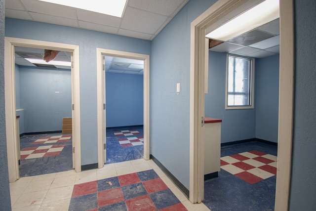 corridor with a drop ceiling