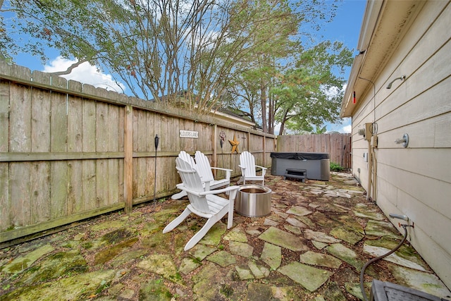 view of patio featuring a hot tub