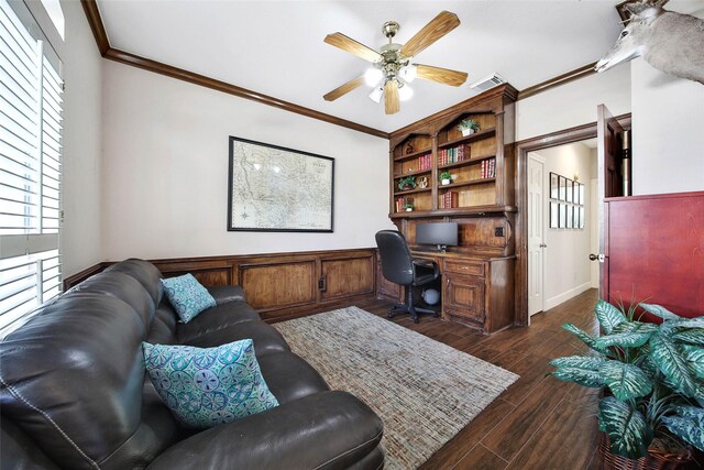 office area with dark hardwood / wood-style floors, ceiling fan, and crown molding