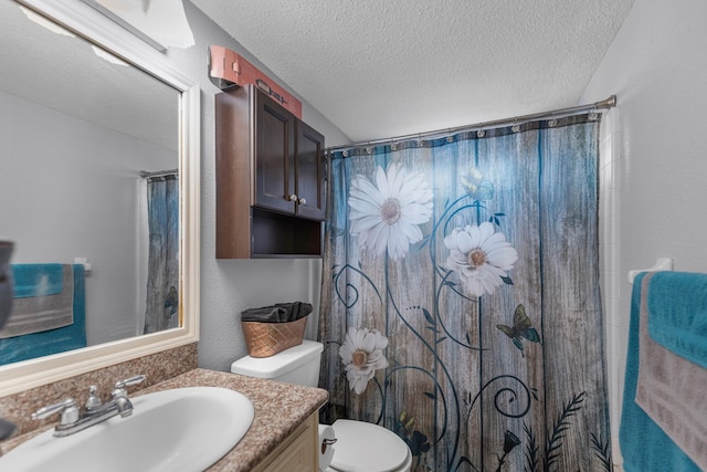 full bathroom with toilet, a textured ceiling, vanity, and a shower with curtain