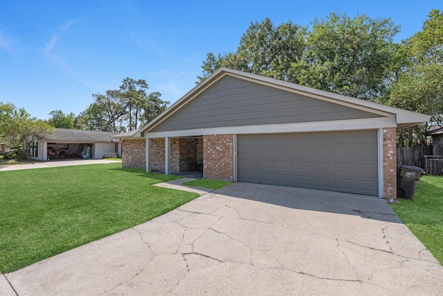 single story home featuring brick siding, concrete driveway, and an attached garage