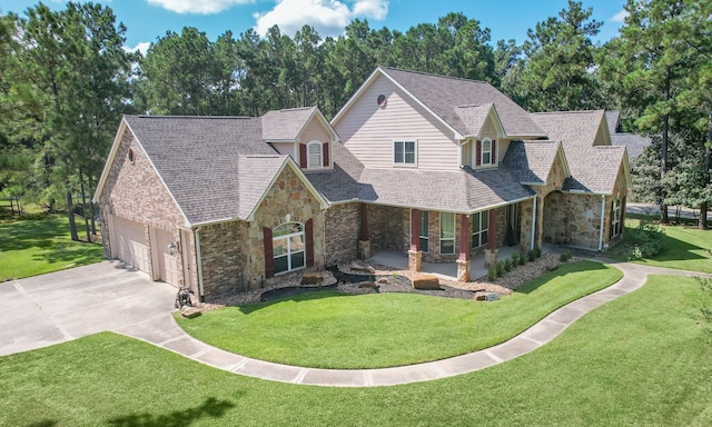 view of front facade featuring a front lawn and covered porch