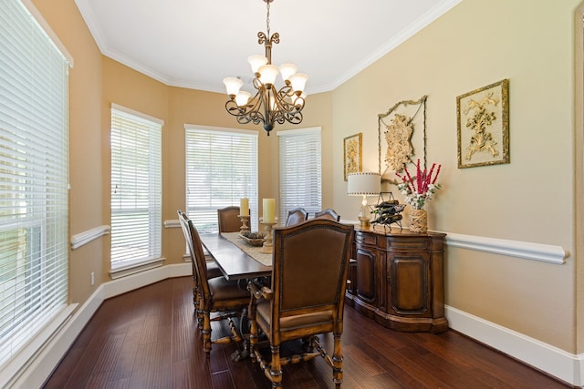 dining room featuring a healthy amount of sunlight, dark hardwood / wood-style flooring, and ornamental molding