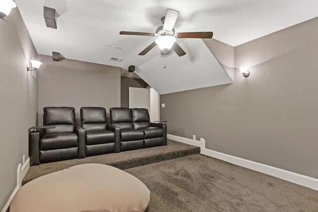 home theater featuring lofted ceiling, carpet flooring, and ceiling fan