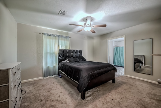 bedroom with light carpet, a textured ceiling, and ceiling fan