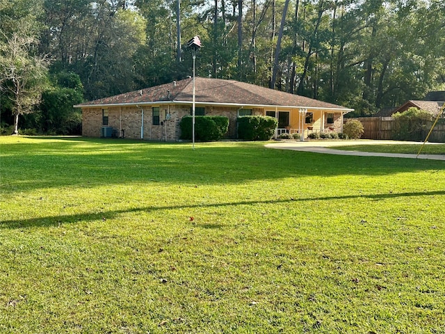 view of yard with central air condition unit