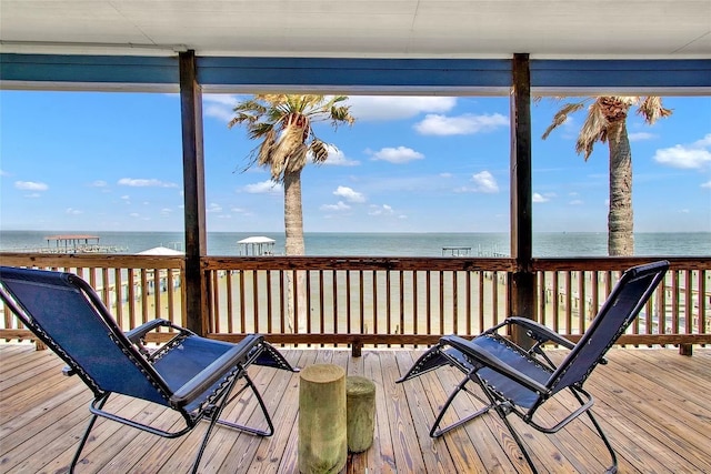 deck featuring a water view