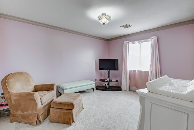 carpeted bedroom featuring crown molding