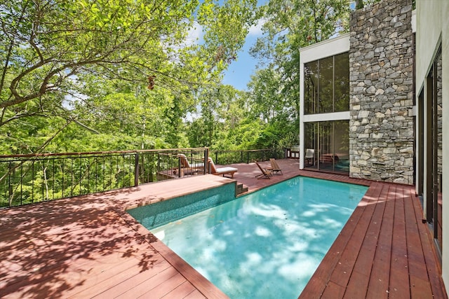 view of pool featuring a deck