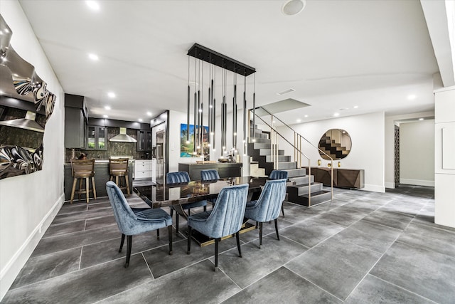 dining area featuring indoor bar