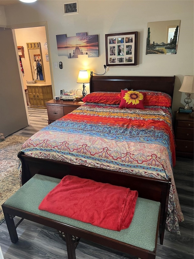 bedroom featuring hardwood / wood-style floors