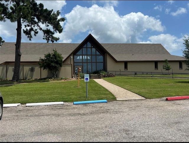 exterior space with a front lawn