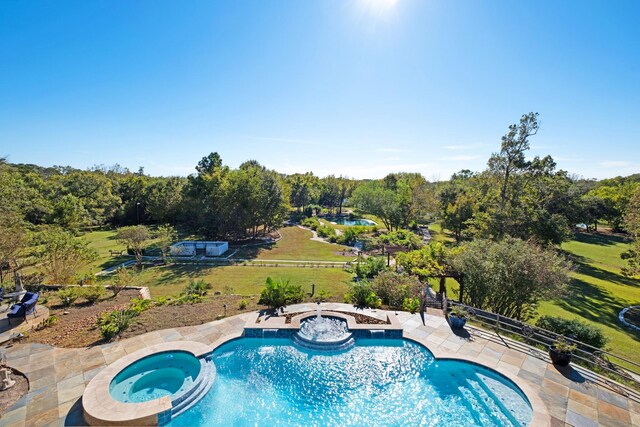 4 Steven Luke Ln, Friendswood, TX 77546 - view of swimming pool with a pool with connected hot tub, a patio, and a lawn
