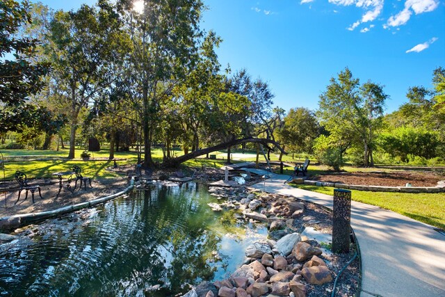 4 Steven Luke Ln, Friendswood, TX 77546 - view of property's community featuring view of scattered trees