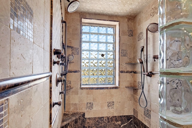 bathroom featuring a tile shower