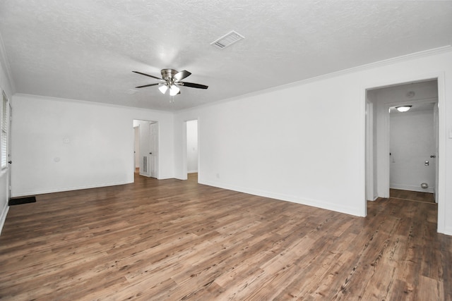 unfurnished room with ceiling fan, a textured ceiling, and dark hardwood / wood-style floors