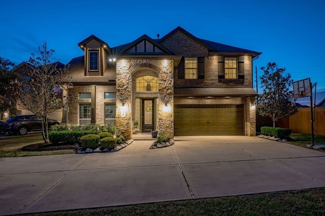 view of front of property with a garage