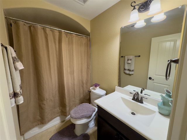 bathroom with vanity, a shower with shower curtain, tile patterned floors, and toilet