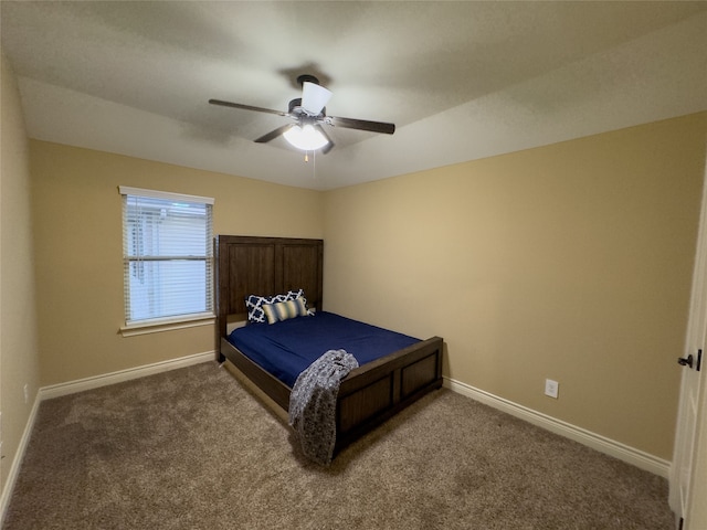 bedroom with ceiling fan and carpet floors