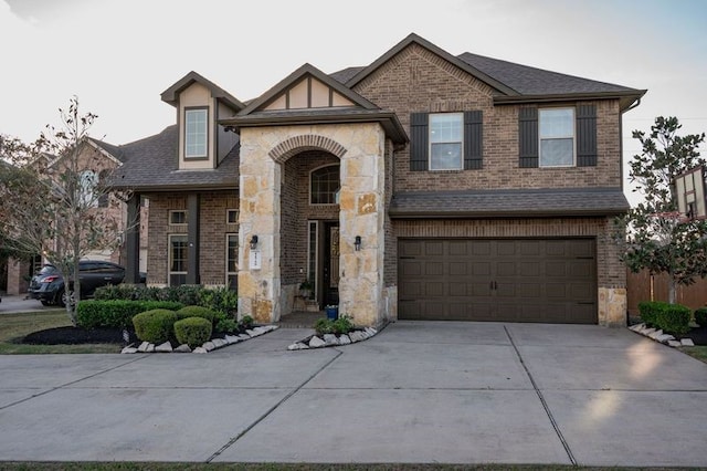 view of front of property with a garage