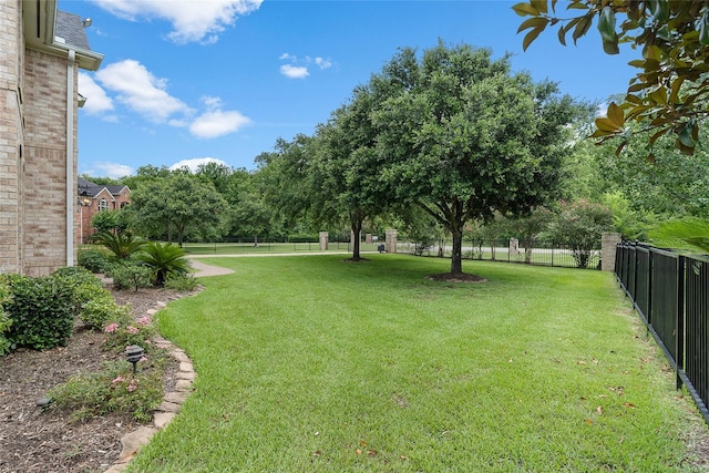 view of yard with fence