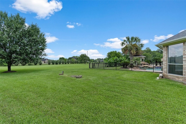 view of yard featuring fence