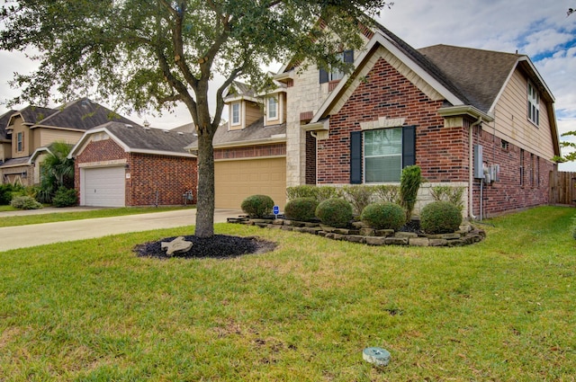 view of front facade with a front yard and a garage