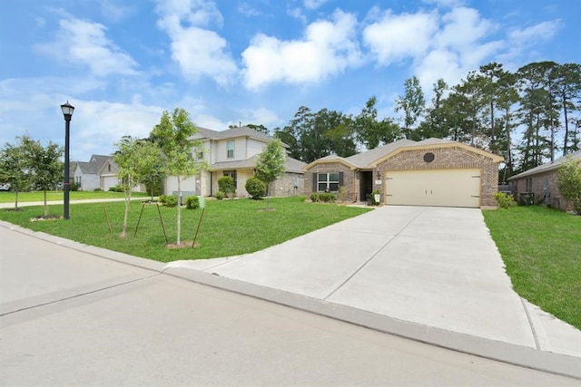 view of front of house with a garage and a front yard