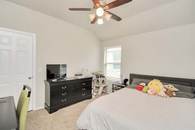 carpeted bedroom featuring ceiling fan and lofted ceiling