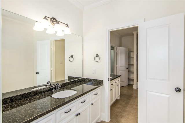 bathroom featuring tile patterned floors, vanity, and ornamental molding