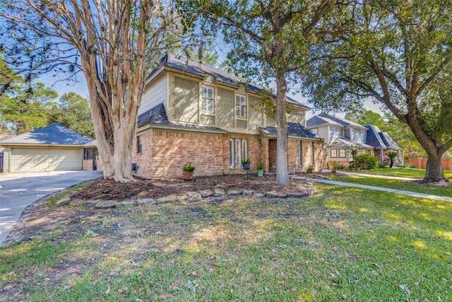 view of front of home featuring a garage and a front lawn