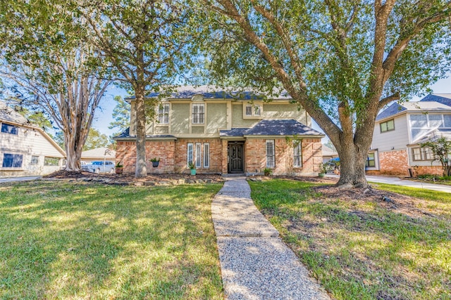 view of front of house with a front lawn