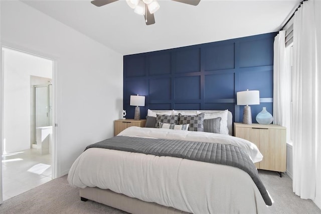 bedroom featuring light carpet and ceiling fan