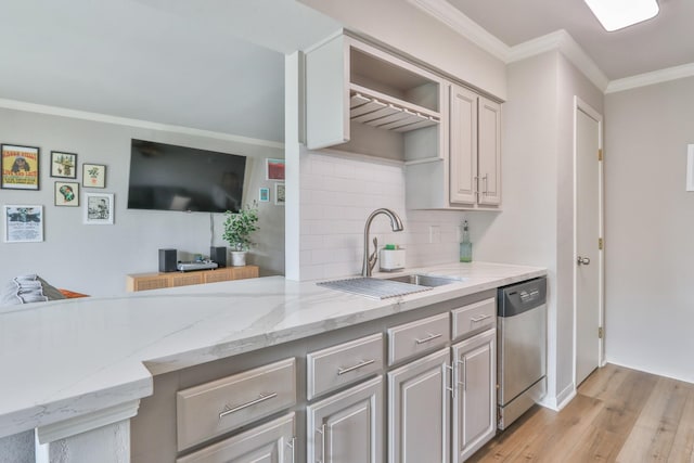 kitchen with crown molding, light stone countertops, sink, stainless steel dishwasher, and light hardwood / wood-style flooring