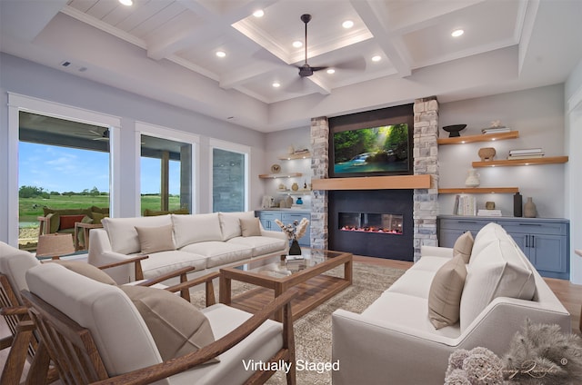 living room with a fireplace, beamed ceiling, and coffered ceiling