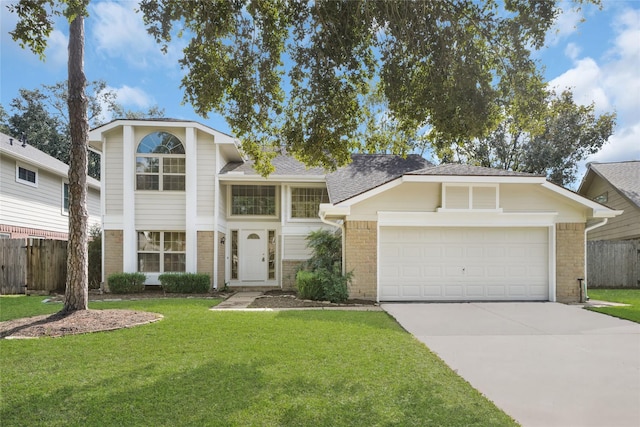 3327 Larkwood Ln, Sugar Land, TX 77479 - view of front of property featuring driveway, brick siding, an attached garage, and roof with shingles