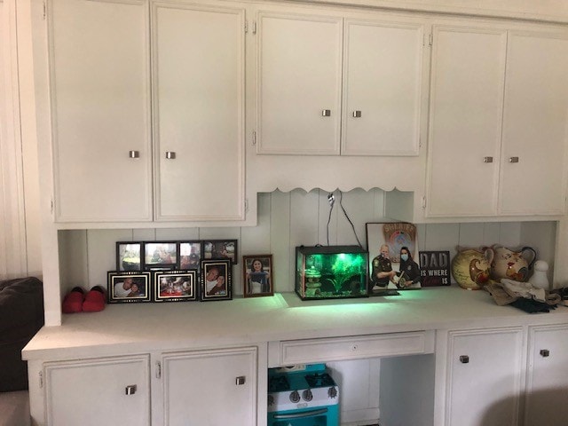 kitchen with white cabinetry