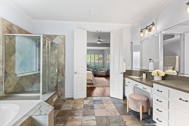 bathroom featuring vanity, crown molding, and plus walk in shower