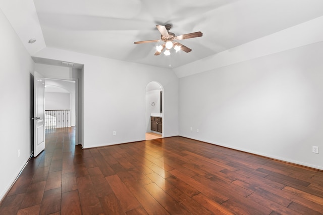 unfurnished bedroom with vaulted ceiling, ceiling fan, and dark hardwood / wood-style flooring