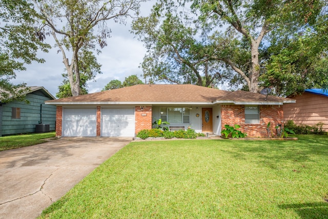 single story home with central AC unit, a garage, and a front lawn