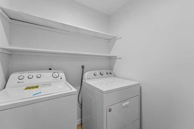 laundry room featuring washing machine and dryer