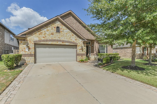 view of front facade with a front lawn and a garage